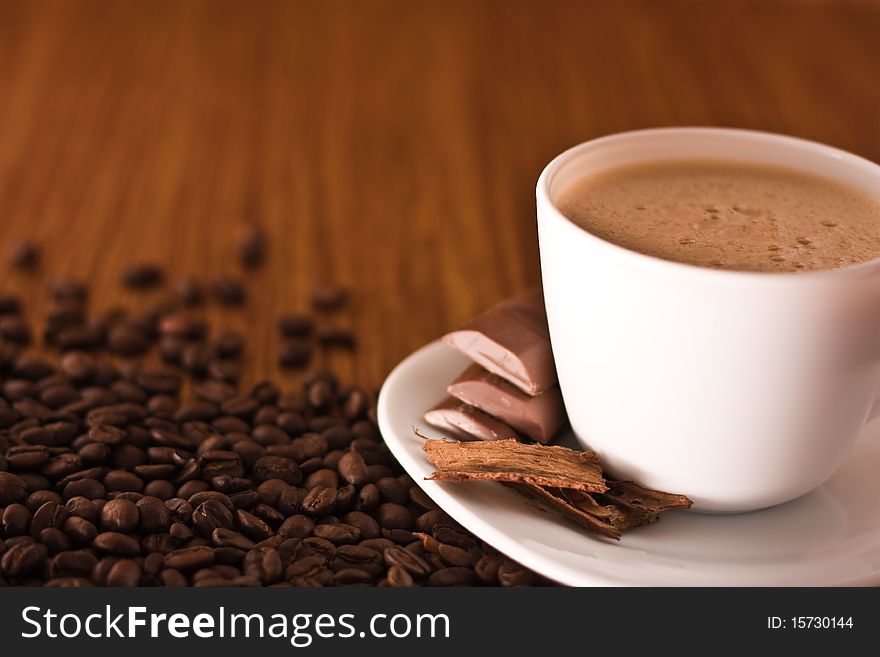 Cup pf coffee on wood background