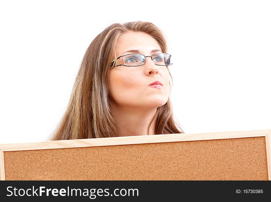 A young attractive woman with a corkboard