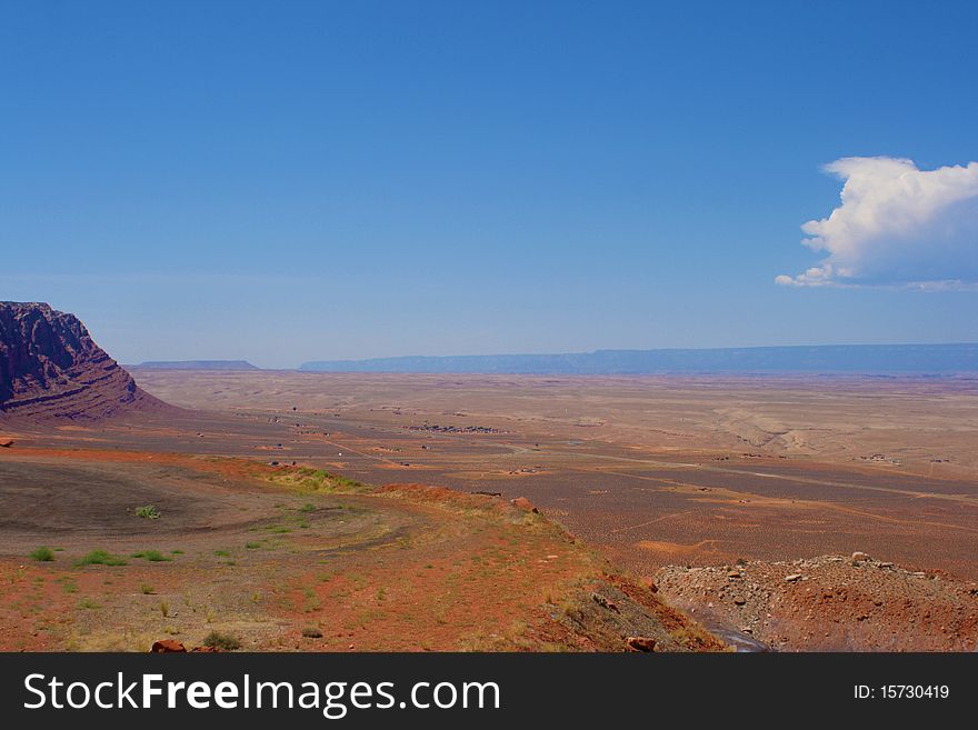 The desert with a mountain in the distance. The desert with a mountain in the distance.