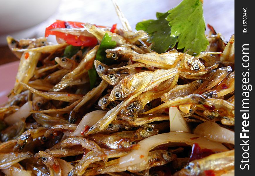 Small fish fried in dish. Small fish fried in dish