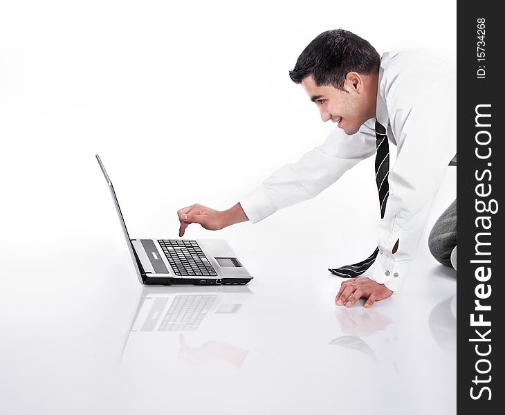 Businessman click ENTER on laptop, isolated on white with reflections