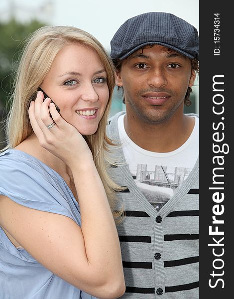 Closeup of young couple with telephone. Closeup of young couple with telephone