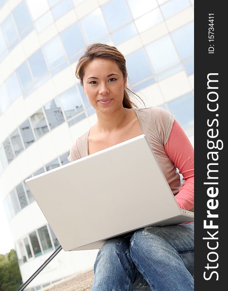 Young woman studying on computer