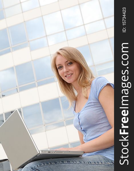 Beautiful Blond Woman With Computer