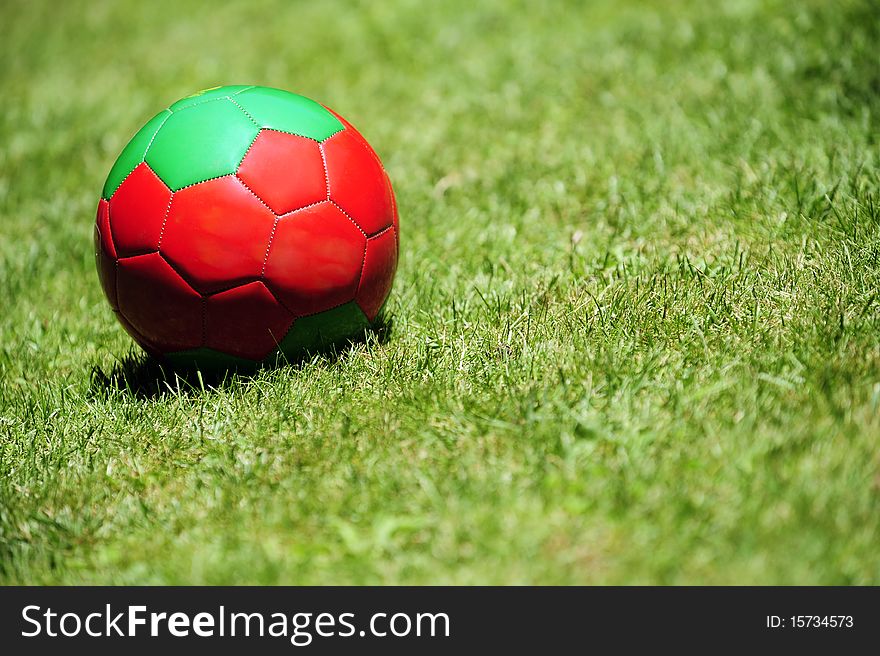 A soccer ball on a football pitch