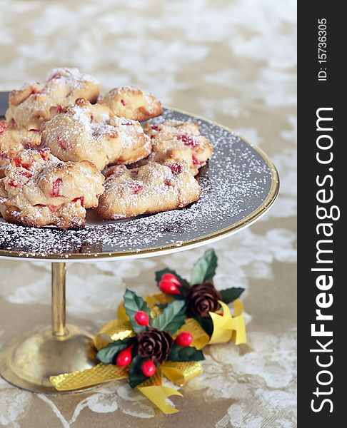 Light as air shortbread dessert baked with candied cherries and dusted with icing sugar. Light as air shortbread dessert baked with candied cherries and dusted with icing sugar