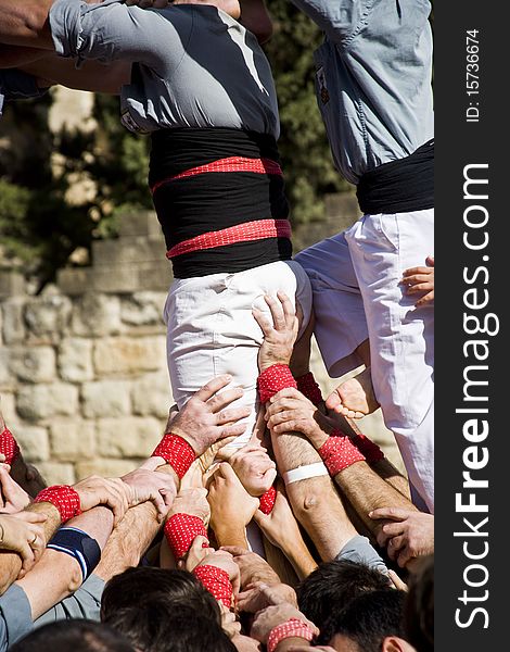 Castellers, human towers, in Sant Cugat del Valles, near to Barcelona. Catalonia, Spain.