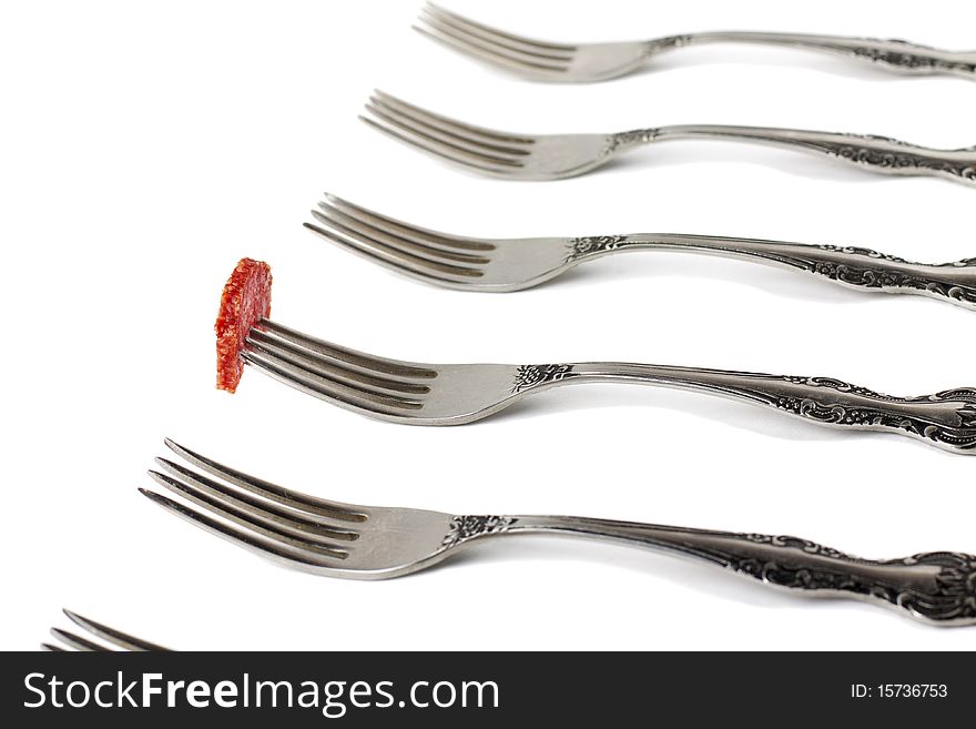 Forks And Piece Of Sausage