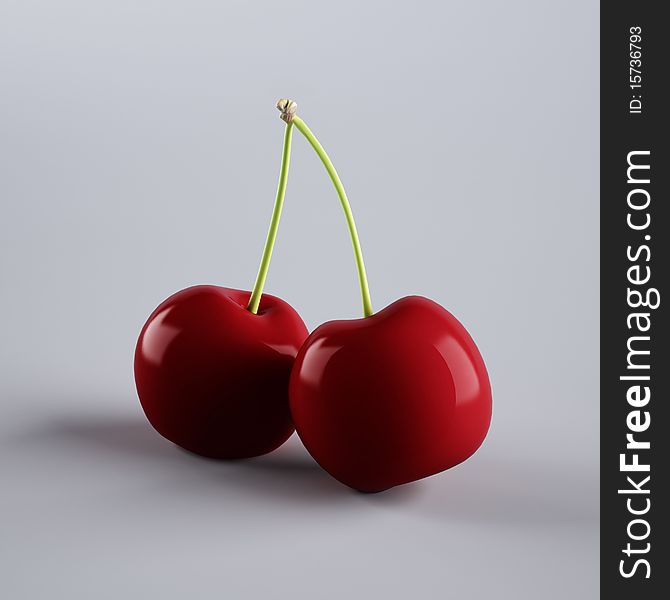 Two cherries on clean ground
