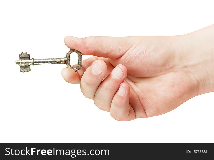 Retro key in hand isolated over white