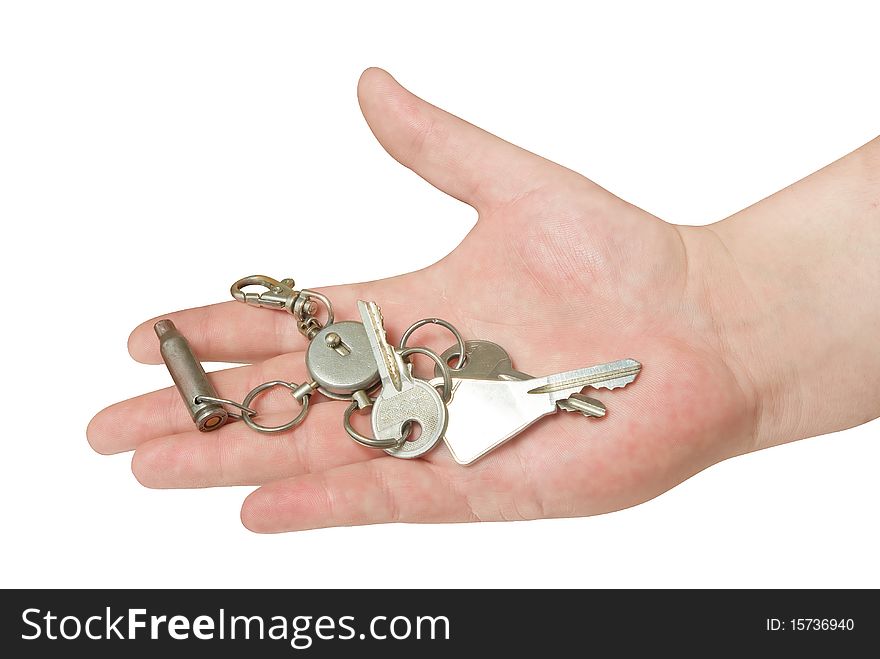 Key in the hand isolated with clipping path. Key in the hand isolated with clipping path