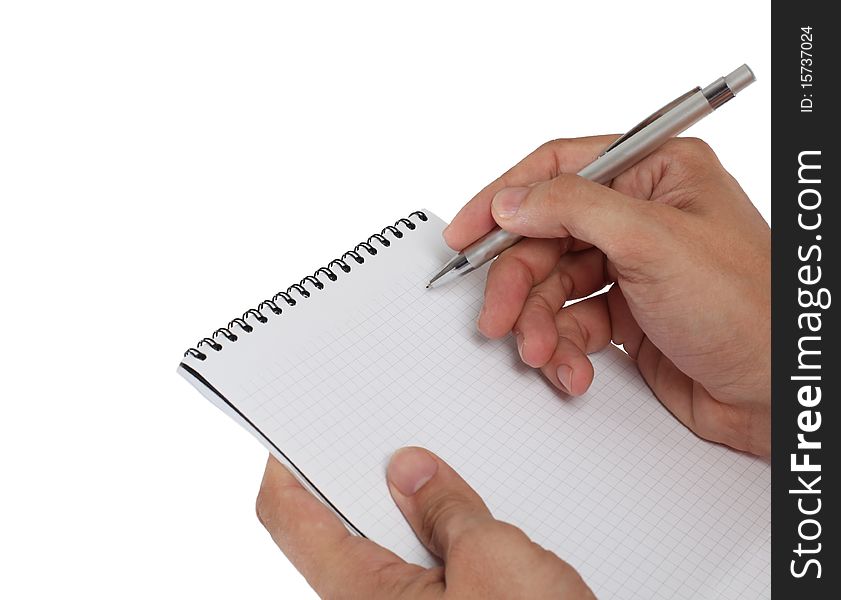 Notebook in hand on a white background