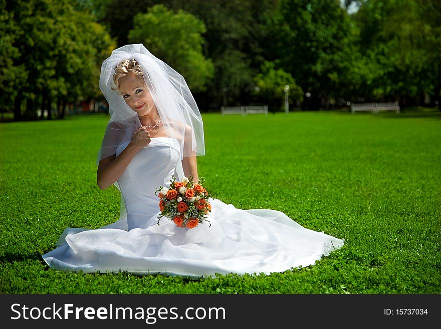 Young beautiful  bride outdoor wedding