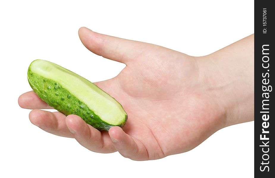 Sliced cucumber in hand isolated with path