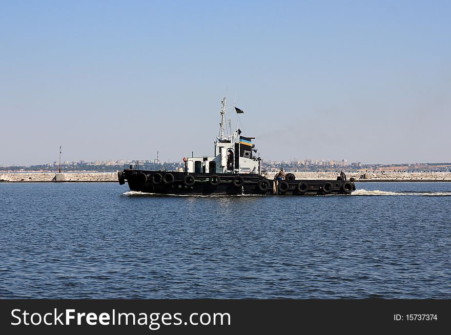 Image moving tugboat at water area