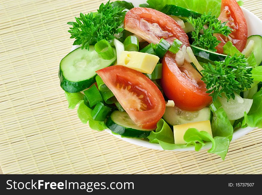 Healthy salad with tomato, cucumber, cheese