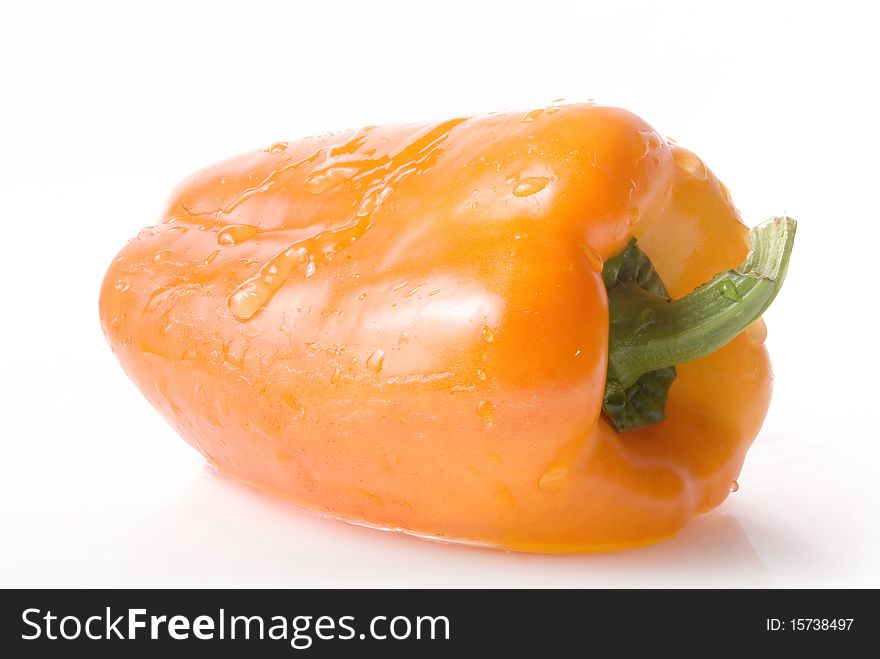 Orange pepper in transparent water. Orange pepper in transparent water