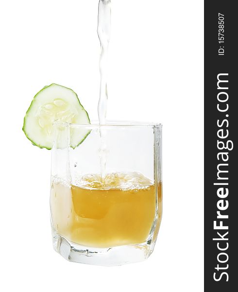 Brine with cucumber in glass isolated with path