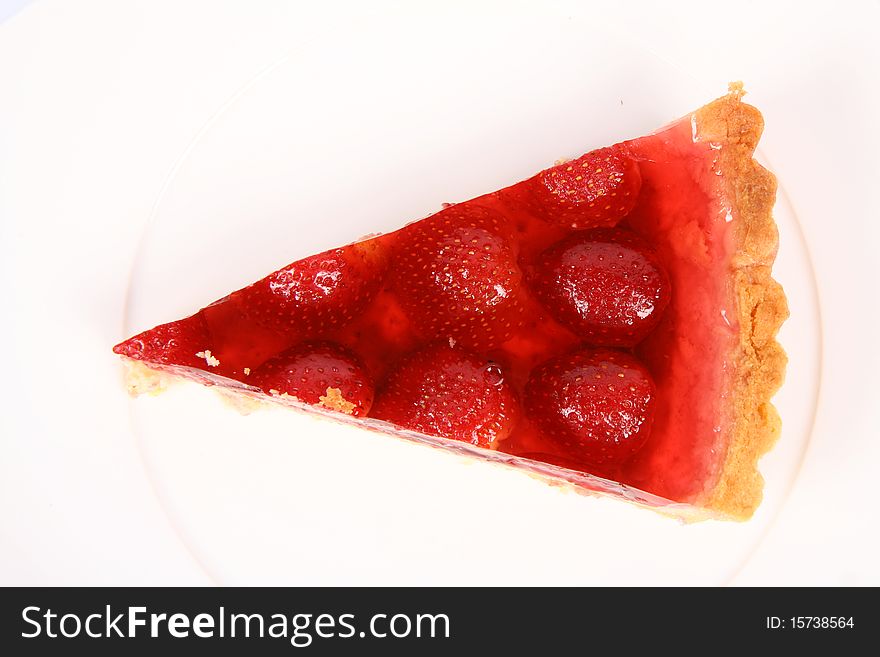 Piece of a Strawberry Tart on a white plate