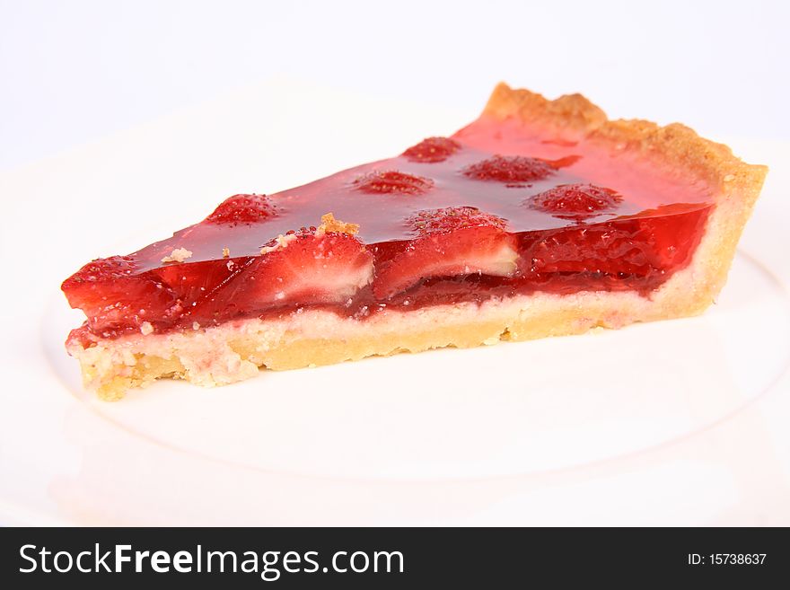 Piece of Strawberry Tart on a white plate
