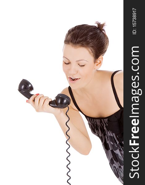 Young alluring girl calling at the phone