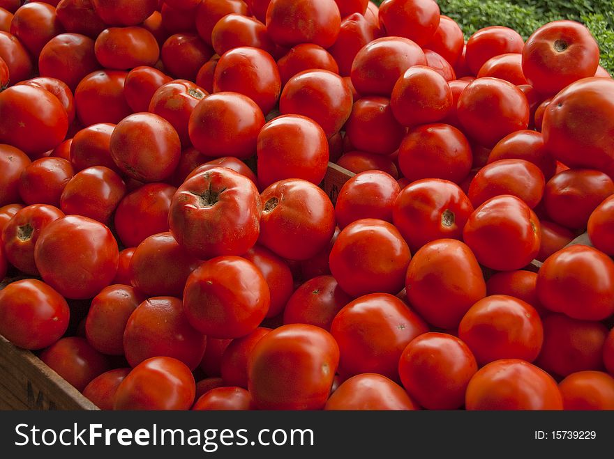 Tomatoes On Vegetable Stand
