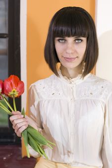 Young Woman Holding Bouquet Stock Photo