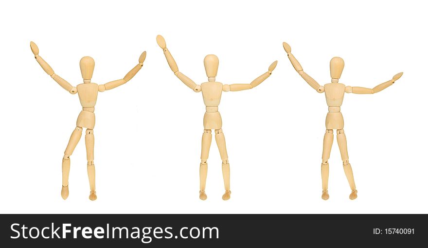 Three artist's mannequins in a row with their arms in the air. Three artist's mannequins in a row with their arms in the air