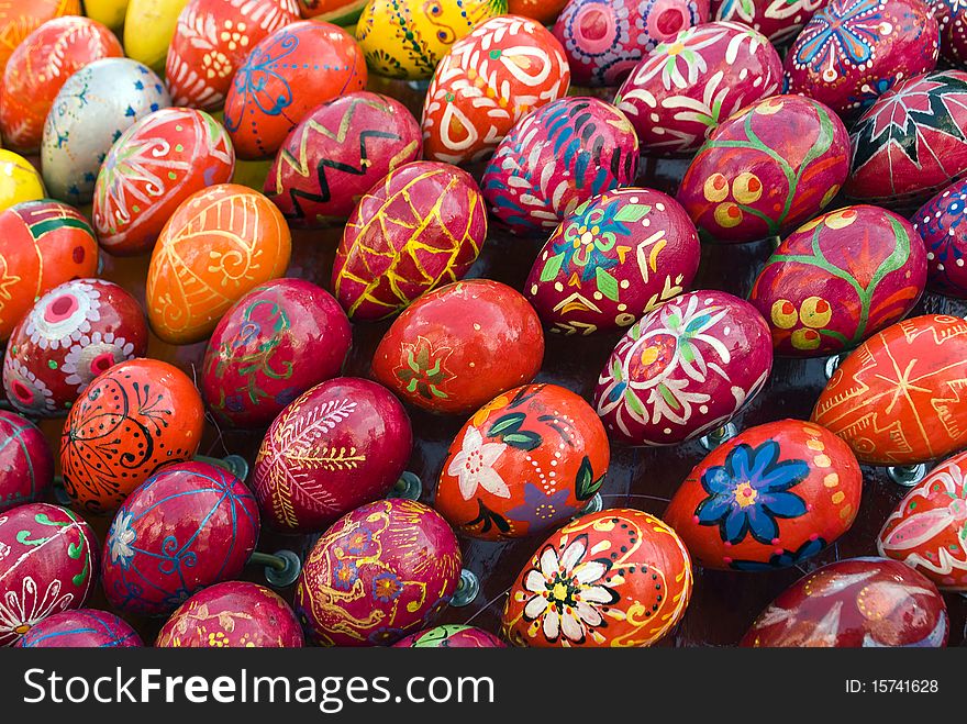 Yellow, red, orange painted Easter Eggs