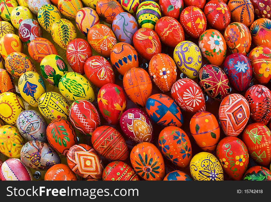 Yellow, red, orange painted Easter Eggs