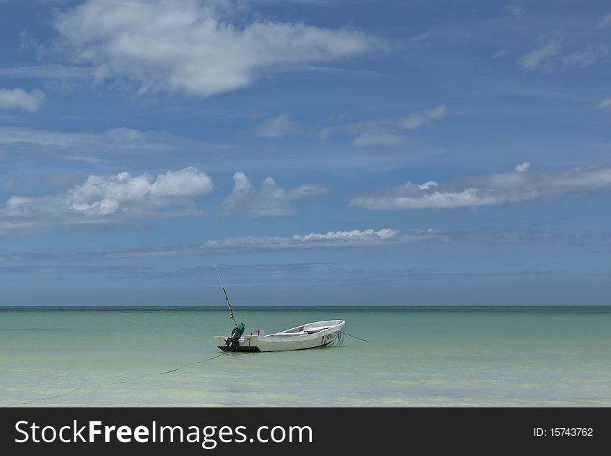 Fishing boat on the beach, Isla Holbox, Quintana Roo, Mexico. Fishing boat on the beach, Isla Holbox, Quintana Roo, Mexico