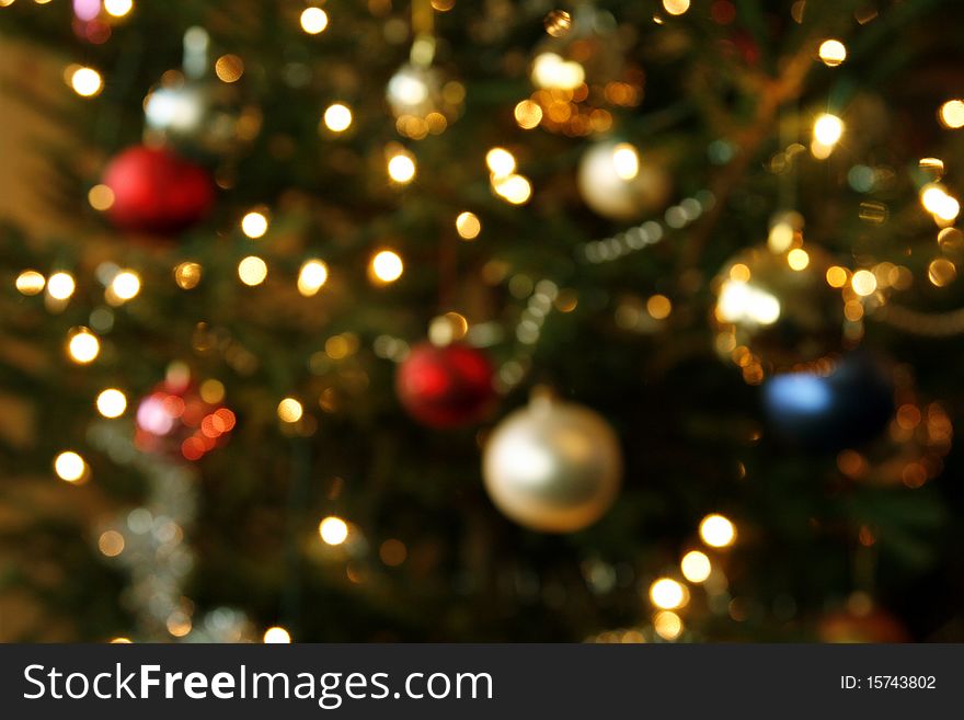 Blurred background from christmas tree with baubles and the lights. Blurred background from christmas tree with baubles and the lights