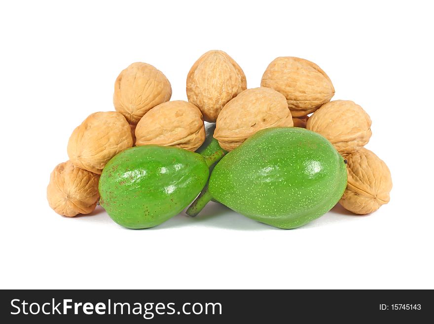 Ripe and unripe walnuts isolated on white