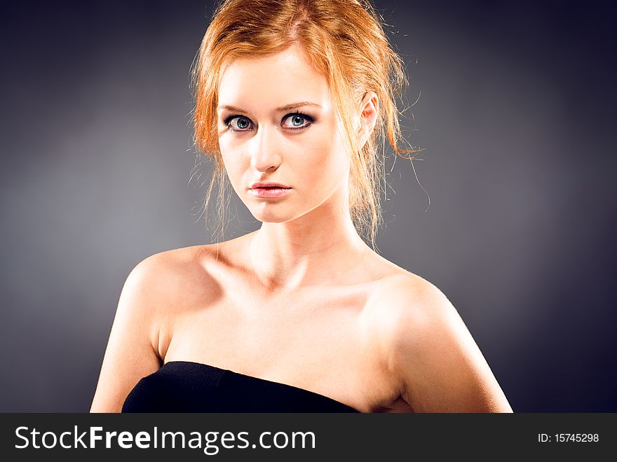 Portrait of a young red-haired woman. Portrait of a young red-haired woman