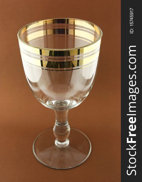 Retro goblet on the brown background