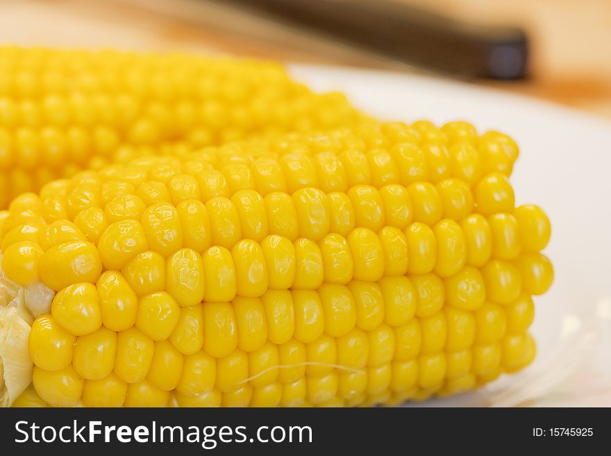 Close up of a sweetcorn and butter (corn on the cob). Close up of a sweetcorn and butter (corn on the cob)