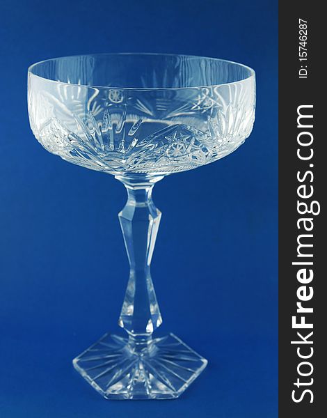 Transperent glass on the blue background
