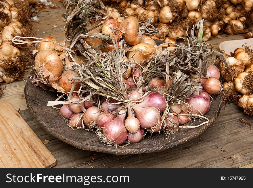 Plate with the onion at the traditional market. Plate with the onion at the traditional market