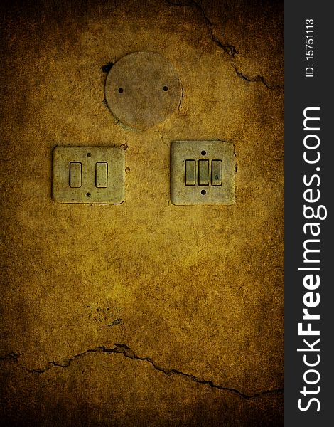 A  yellow grunge concrete background with switch. A  yellow grunge concrete background with switch