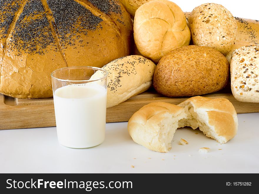 Fresh bread on the board with the sour cherry of the milk. Fresh bread on the board with the sour cherry of the milk