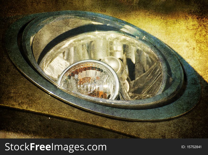 A grunge close up of an headlight. A grunge close up of an headlight
