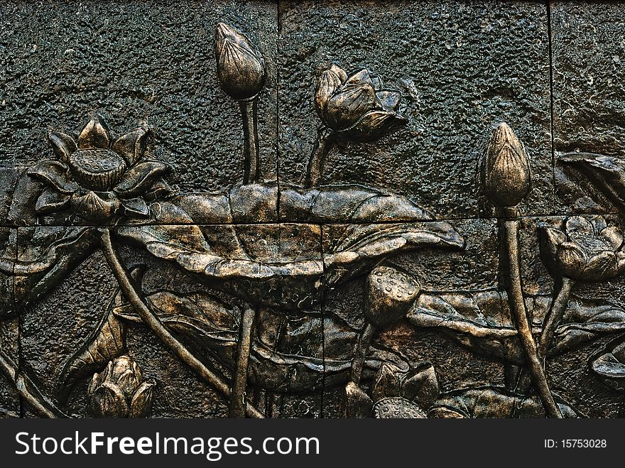 Lotus on stucco wall background. Lotus on stucco wall background.