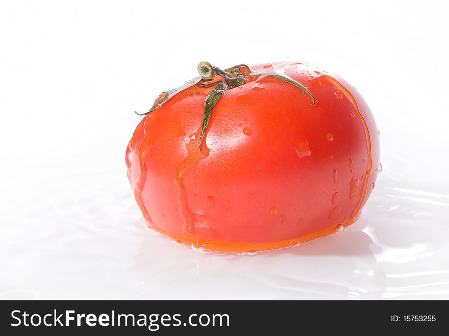 Fresh tomatoe in water