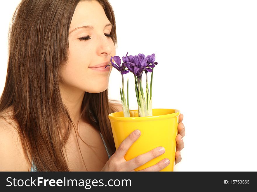 Young brunette woman with flowerpot