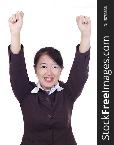An Asian businesswoman with her arms raised. An Asian businesswoman with her arms raised