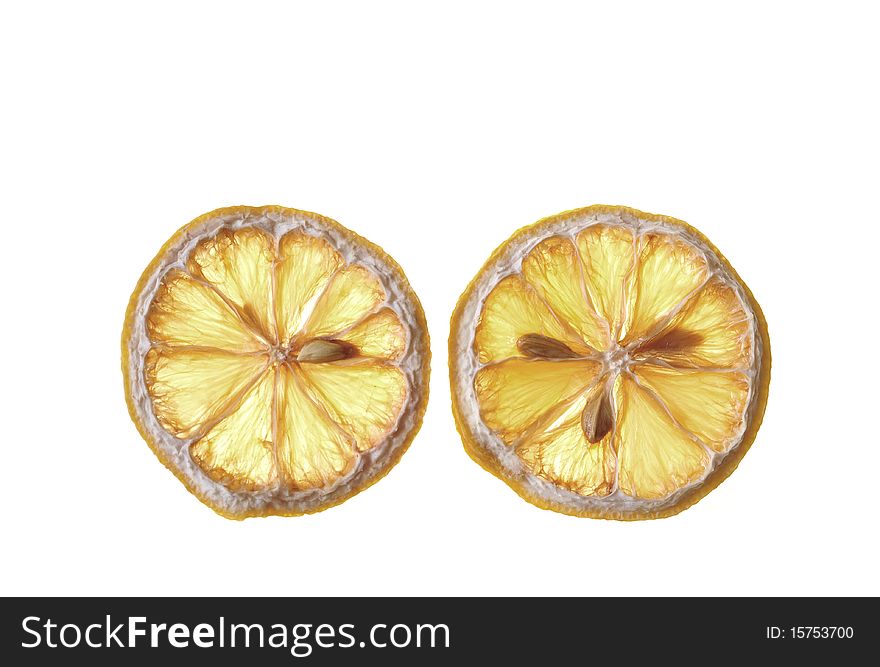 Two round lobules of dry lemon