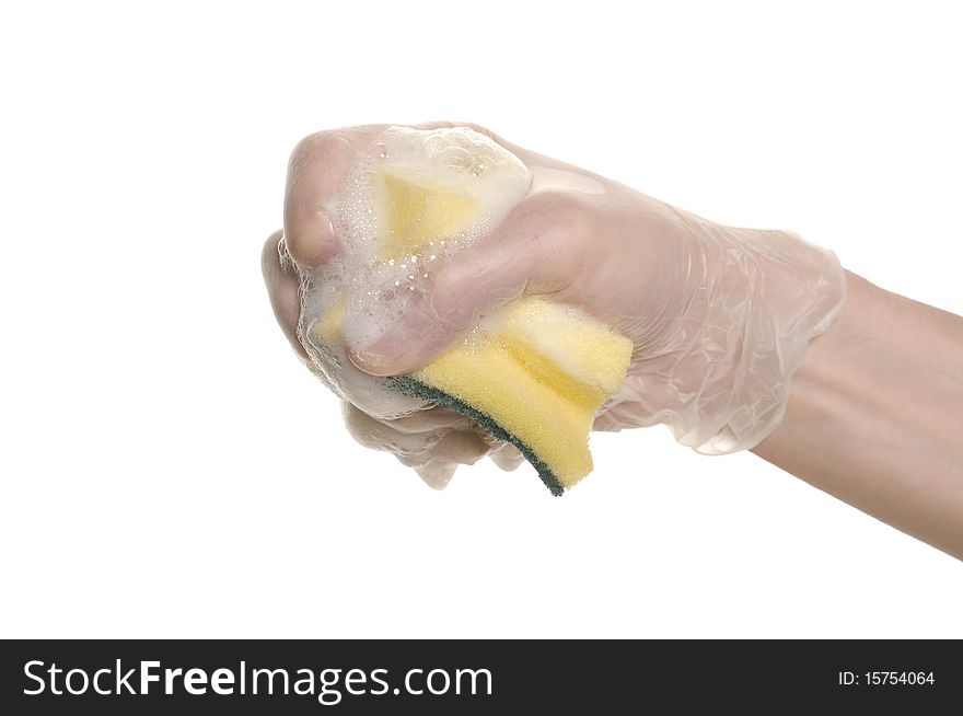 Hand with a sponge isolated over white