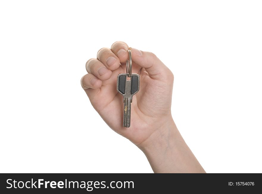 Business man hand with a key isolated over white