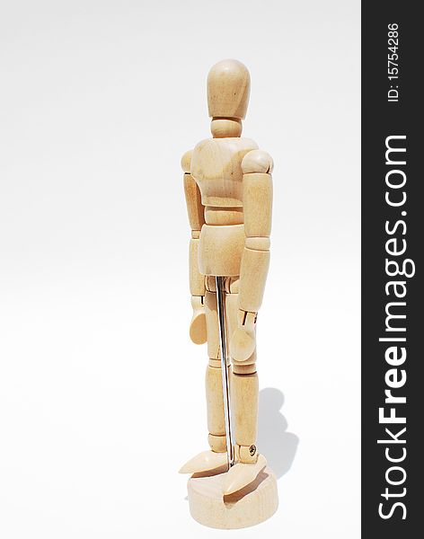 Wooden mannequin human scale model. Full body in side view on white background. Wooden mannequin human scale model. Full body in side view on white background.