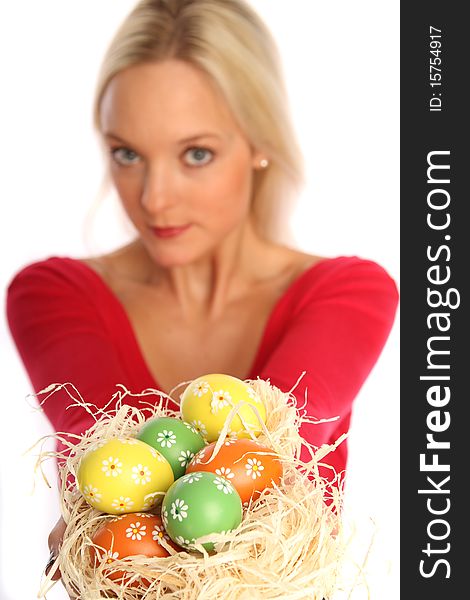 Beautiful blond woman holding some easter eggs. Beautiful blond woman holding some easter eggs